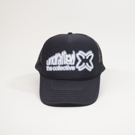 Black cap with white logo on a light gray background